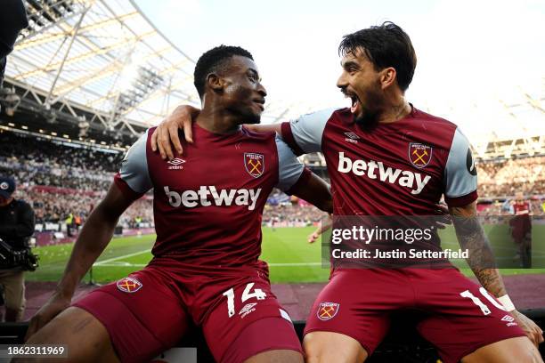 Mohammed Kudus of West Ham United celebrates with Lucas Paqueta of West Ham United after scoring their team's second goal during the Premier League...