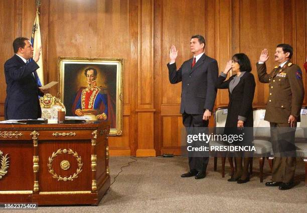 Venezuelan President Hugo Chavez , swears in Edgar Hernandez Berhens , Adina Bastidas , and military chief Alfredo Pardo Acosta , in Caracas, 05...