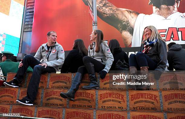 Olympic athletes Billy Demong, Heather McPhie and Gretchen Bleiler ride through Times Square with the Budweiser Clydesdales during the USOC 100 Days...