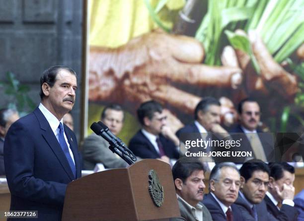 President Vicente Fox is seen speaking to the farming sector during ceremonies in Mexico City 28 April 2003. El presidente de México, Vicente Fox,...