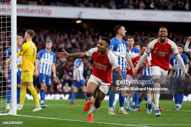 Gabriel Jesus of Arsenal celebrates after scoring their team's first goal during the Premier League match between Arsenal FC and Brighton & Hove...