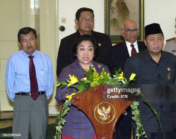 Indonesian President Megawati Sukarnoputri announces over Indonesian stance about Iraq war as Vice President Hamzah Haz , Top Economy minister,...