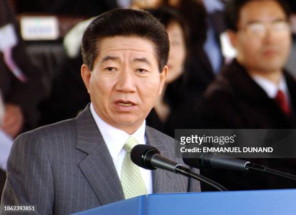South Korean President Roh Moo-Hyun speaks in Seoul 11 March 2003 during the graduation ceremony at the Korean Military Academy, the training school...