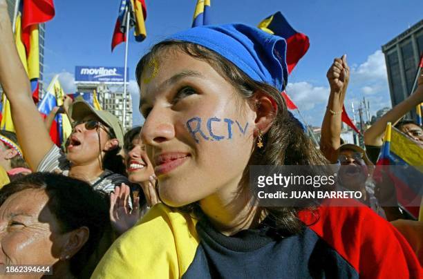 Opponents of Venezuelan President Hugo Chavez gather for a large protest 31 January 2003 in Caracas. The leftist-populist president is facing a...