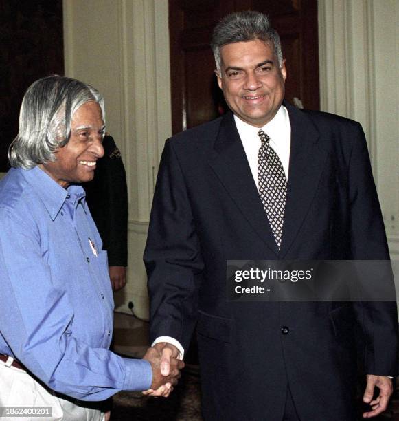 Indian President Abdul Kalam greets Sri Lankan Prime Minister Ranil Wickremasinghe before a meeting in New Delhi, 01 March 2003. Wickremasinghe is in...