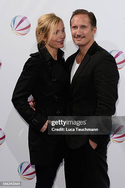 Benno Fuermann and Nadja Uhl attend 'In einem wilden Land' Premiere at Astor Film Lounge on October 29, 2013 in Berlin, Germany.