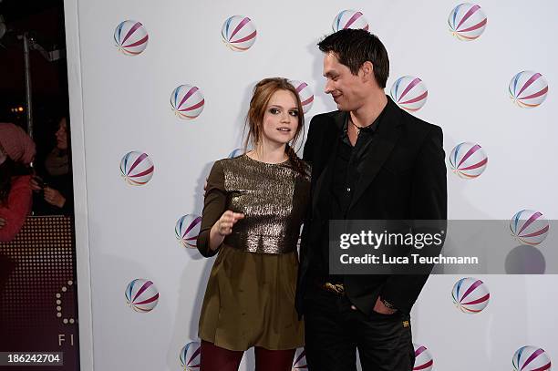 Emilia Schuele and Wesley French attend 'In einem wilden Land' Premiere at Astor Film Lounge on October 29, 2013 in Berlin, Germany.