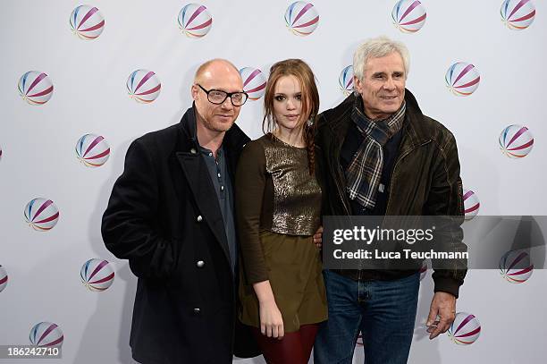 Emilia Schuele; Simon Schwarz and Gojko Mitic attend 'In einem wilden Land' Premiere at Astor Film Lounge on October 29, 2013 in Berlin, Germany.