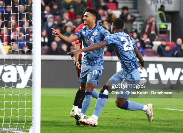 Ollie Watkins of Aston Villa celebrates scoring their teams second goal during the Premier League match between Brentford FC and Aston Villa at Gtech...