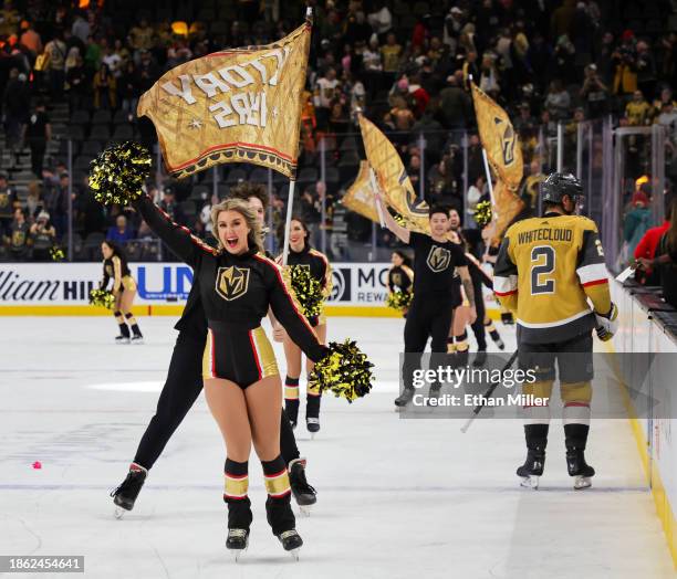 Members of the Knights Guard take a victory lap as they celebrate the Vegas Golden Knights' 5-4 overtime victory over the Calgary Flames at T-Mobile...