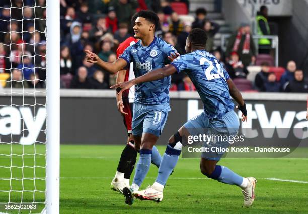 Ollie Watkins of Aston Villa celebrates scoring their teams second goal during the Premier League match between Brentford FC and Aston Villa at Gtech...