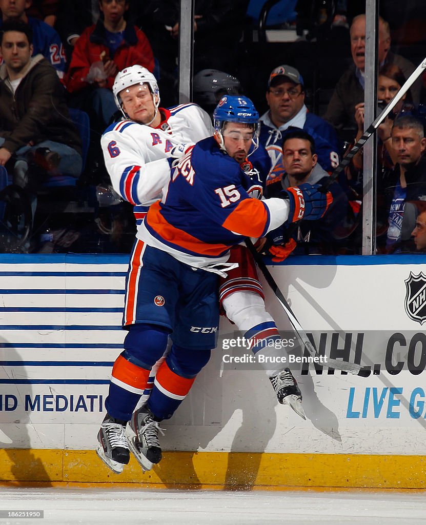 Islanders Rangers Fight Cal Clutterbuck of the New York Islanders hits Anton Stralman of the ...