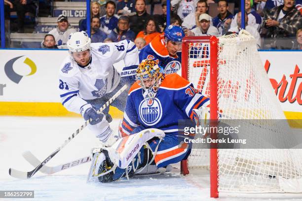 Phil Kessel of the Toronto Maple Leafs scores a goal against Richard Bachman of the Edmonton Oilers during an NHL game on October 29, 2013 at Rexall...