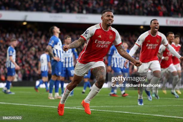 Gabriel Jesus of Arsenal celebrates after scoring their team's first goal during the Premier League match between Arsenal FC and Brighton & Hove...