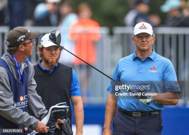 Retief Goosen of South Africa with his son Leo Goosen on the tee on the first hole during the final round of the PNC Championship at The Ritz-Carlton...