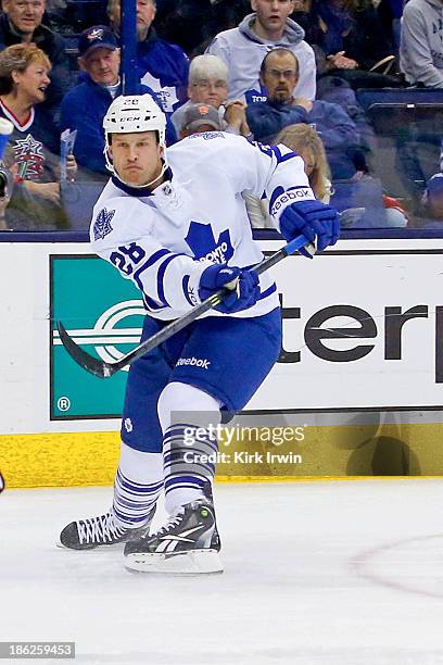 Colton Orr of the Toronto Maple Leafs passes the puck during the game against the Columbus Blue Jackets on October 25, 2013 at Nationwide Arena in...