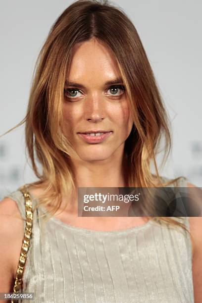 Dovile Virsilaite poses as she arrives for the opening ceremony of the Little Black Jacket exhibition of Chanel in Sao Paulo, Brazil, October 29,...