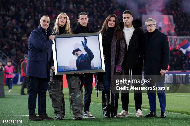 Family of former head coach Sinisa Mihajlovic hold a photo in their memory with Joey Saputo, President of Bologna FC, prior to the Serie A TIM match...