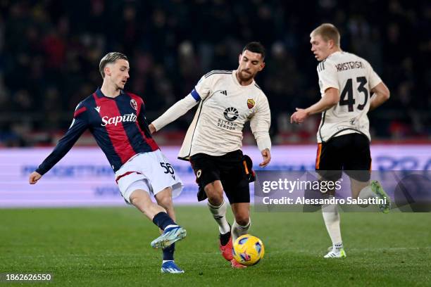 Alexis Saelemaekers of Bologna FC battles for possession with Lorenzo Pellegrini of AS Roma during the Serie A TIM match between Bologna FC and AS...