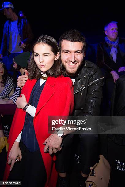 Doyna Ciobanu and Magomed Umkhaev attend the Muscovites by Mashsa Kravtsova show of Mercedes-Benz Fashion Week S/S 14 on October 29, 2013 in Moscow,...