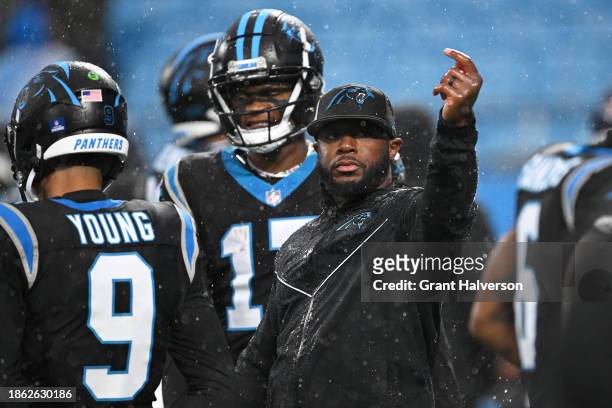 Offensive coordinator Thomas Brown of the Carolina Panthers reacts before the game against the Atlanta Falcons at Bank of America Stadium on December...