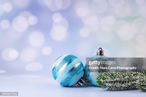 blue christmas bauble christmas background - carol blue stock pictures, royalty-free photos & images