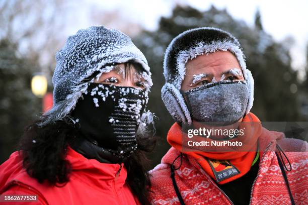 People are running in the morning with frost on their faces in the lowest temperature of -27 degrees in Shenyang, Liaoning Province, China, on...
