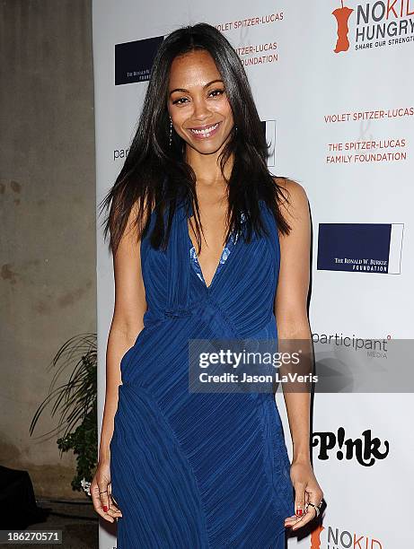 Actress Zoe Saldana attends Share Our Strength's No Kid Hungry dinner at Ron Burkle's Green Acres Estate on October 29, 2013 in Beverly Hills,...