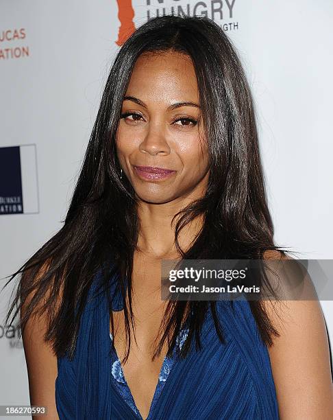 Actress Zoe Saldana attends Share Our Strength's No Kid Hungry dinner at Ron Burkle's Green Acres Estate on October 29, 2013 in Beverly Hills,...