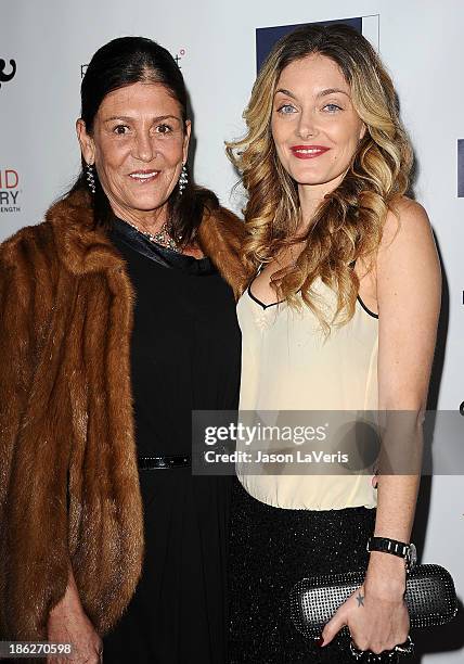 Waylynn Lucas and guest attend Share Our Strength's No Kid Hungry dinner at Ron Burkle's Green Acres Estate on October 29, 2013 in Beverly Hills,...