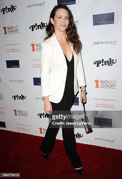 Actress Kristin Davis attends Share Our Strength's No Kid Hungry dinner at Ron Burkle's Green Acres Estate on October 29, 2013 in Beverly Hills,...