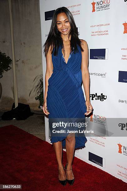 Actress Zoe Saldana attends Share Our Strength's No Kid Hungry dinner at Ron Burkle's Green Acres Estate on October 29, 2013 in Beverly Hills,...