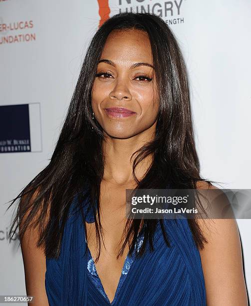 Actress Zoe Saldana attends Share Our Strength's No Kid Hungry dinner at Ron Burkle's Green Acres Estate on October 29, 2013 in Beverly Hills,...