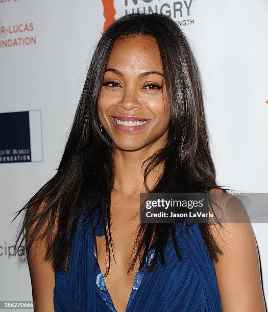 Actress Zoe Saldana attends Share Our Strength's No Kid Hungry dinner at Ron Burkle's Green Acres Estate on October 29, 2013 in Beverly Hills,...