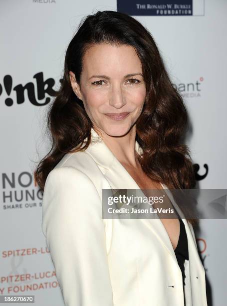 Actress Kristin Davis attends Share Our Strength's No Kid Hungry dinner at Ron Burkle's Green Acres Estate on October 29, 2013 in Beverly Hills,...