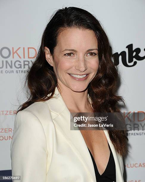Actress Kristin Davis attends Share Our Strength's No Kid Hungry dinner at Ron Burkle's Green Acres Estate on October 29, 2013 in Beverly Hills,...