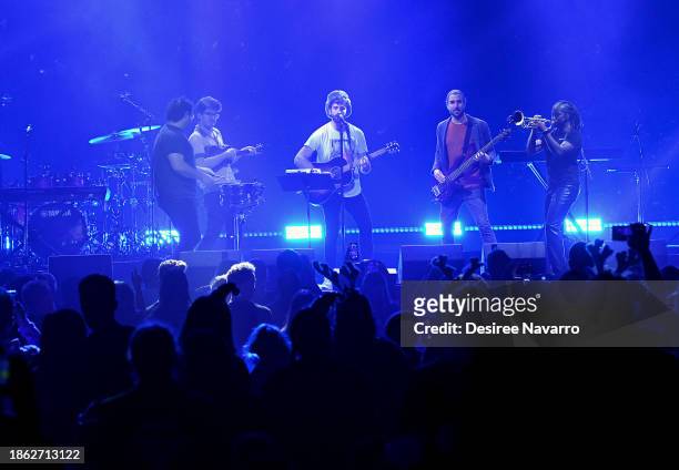 Ryan Met, Jack Met, and Adam Brett Met of AJR perform onstage during iHeartRadio Y100's Jingle Ball 2023 at Amerant Bank Arena on December 16, 2023...