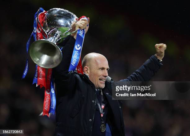 Rangers manager Philippe Clement holds the trophy aloft during the Viaplay Cup Final match between Rangers and Aberdeen at Hampden Park on December...