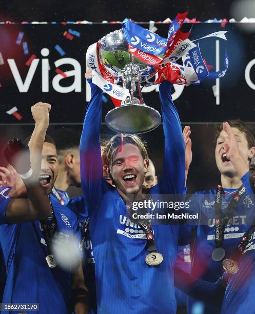 Todd Cantwell of Rangers lifts the trophy during the Viaplay Cup Final match between Rangers and Aberdeen at Hampden Park on December 17, 2023 in...
