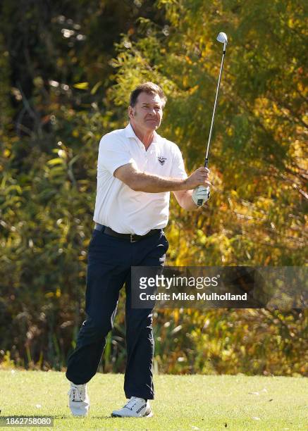 Sir Nick Faldo of England plays a shots on the 13th hole during the final round of the PNC Championship at The Ritz-Carlton Golf Club on December 17,...