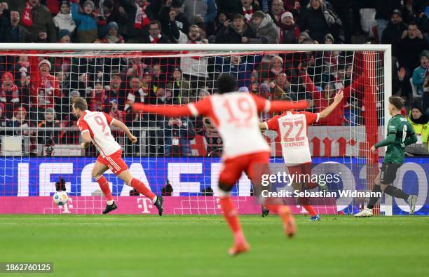 Harry Kane of Bayern Munich celebrates after scoring their team's first goal during the Bundesliga match between FC Bayern München and VfB Stuttgart...