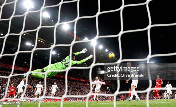 Andre Onana of Manchester United makes a save during the Premier League match between Liverpool FC and Manchester United at Anfield on December 17,...