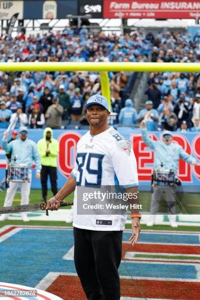 Former Tennessee Titans player Eddie George celebrates prior to a game against the Houston Texans at Nissan Stadium on December 17, 2023 in...