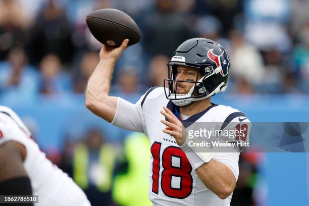 Case Keenum of the Houston Texans attempts a pass during the first quarter against the Tennessee Titans at Nissan Stadium on December 17, 2023 in...