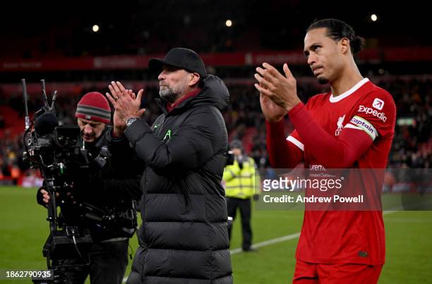Jurgen Klopp manager of Liverpool and Virgil van Dijk captain of Liverpool showing their appreciation to the fans at the end of the Premier League...