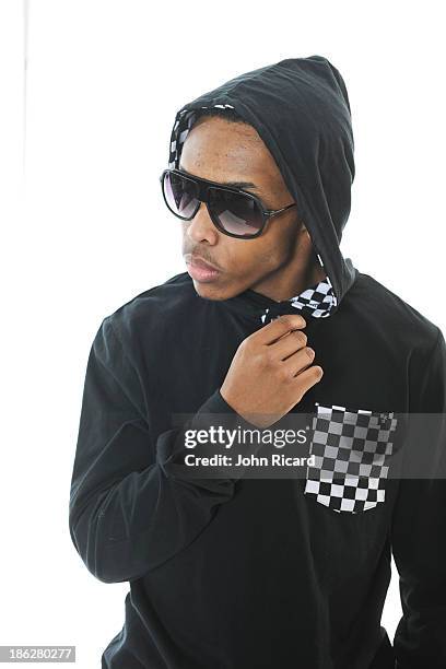 Prodigy of Mindless Behavior poses during a portrait session at John Ricard Studio on March 12, 2013 in New York City.