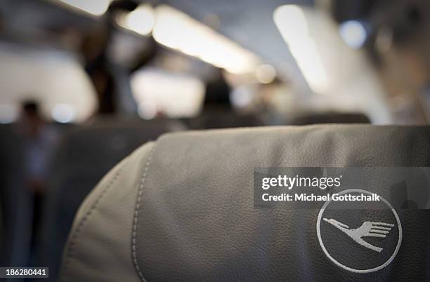 Lufthansa Logo on a airplane Seat in a plane on October 28, 2013 in Munich, Germany.