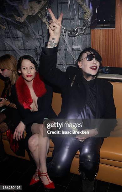 Marilyn Manson hosts a Halloween bash with his fiance Lindsay Usich at Hyde Bellagio at the Bellagio on October 29, 2013 in Las Vegas, Nevada.