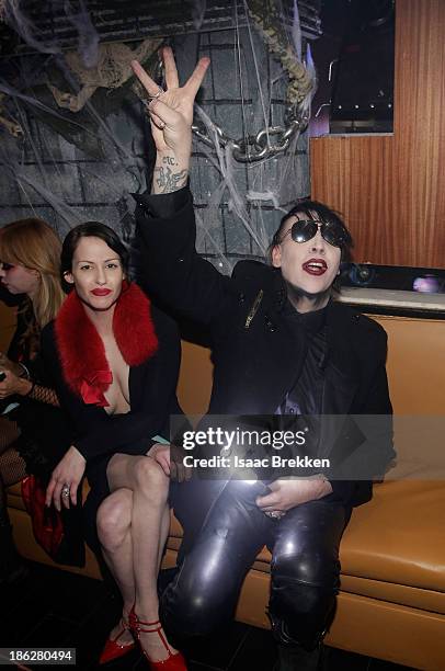 Marilyn Manson hosts a Halloween bash with his fiance Lindsay Usich at Hyde Bellagio at the Bellagio on October 29, 2013 in Las Vegas, Nevada.