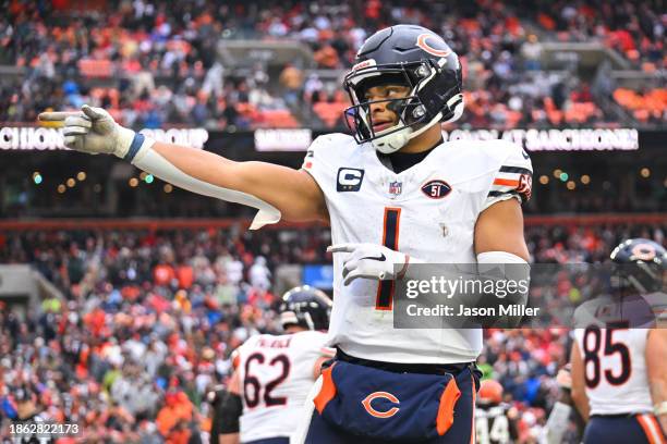 Justin Fields of the Chicago Bears reacts after a touchdown during the second quarter of a game against the Cleveland Browns at Cleveland Browns...